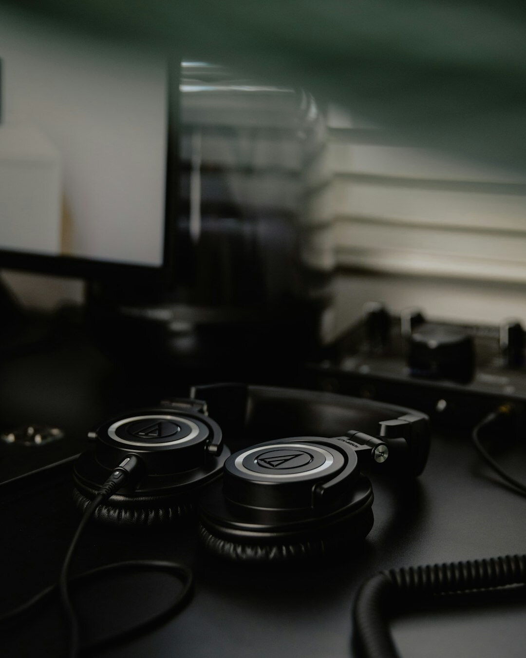 Video switcher desk with monitors and headphones
