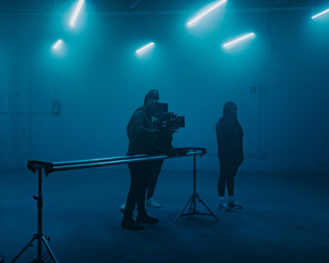 Production crew team standing together in a studio